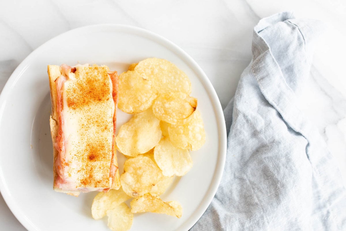 Gerber sandwiches on a parchment lined baking sheet.