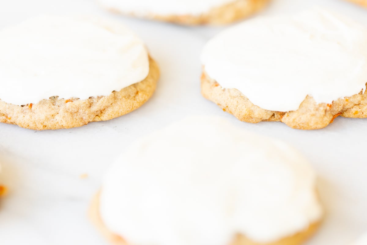 Carrot cake cookies topped with cream cheese frosting.