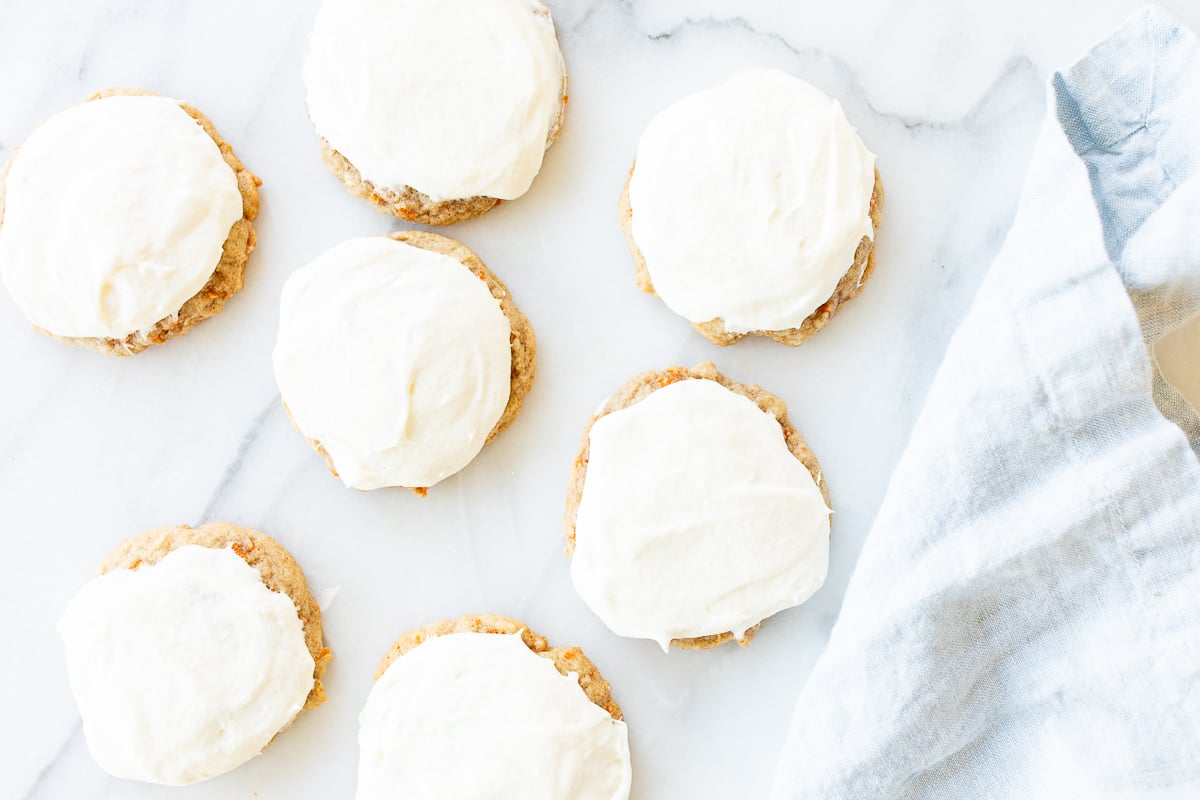 Carrot cake cookies topped with cream cheese frosting.