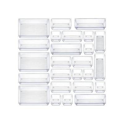 A group of kitchen drawer inserts made of clear plastic containers on a white background.