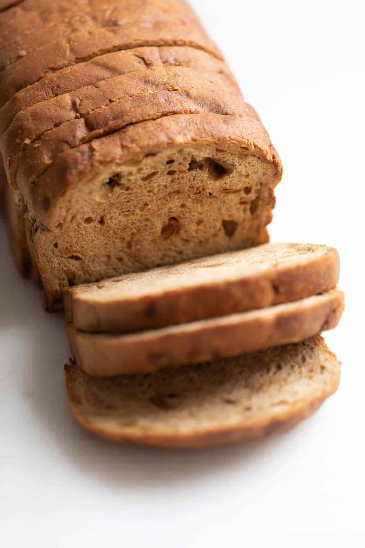 A loaf of apple fritter bread, sliced.