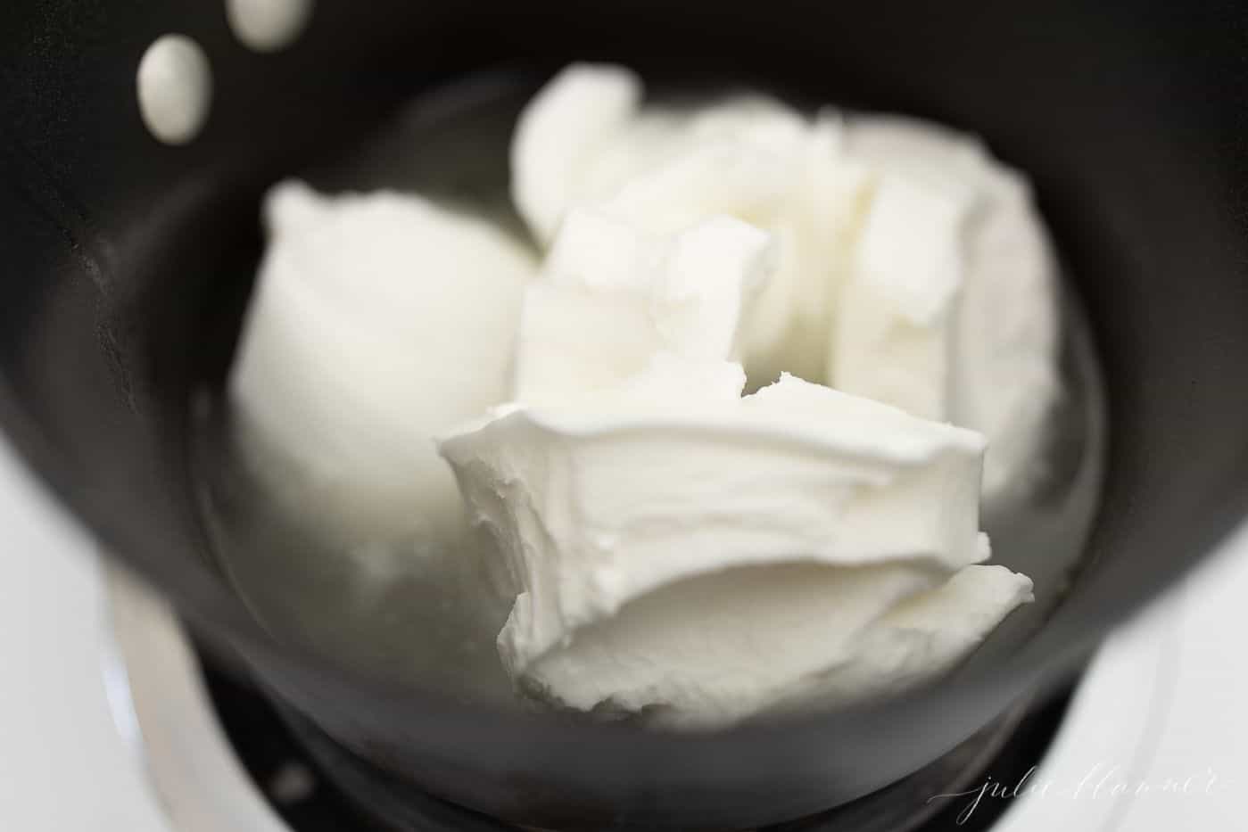 A pan filled with shortening for melting down and frying an easy homemade donut recipe