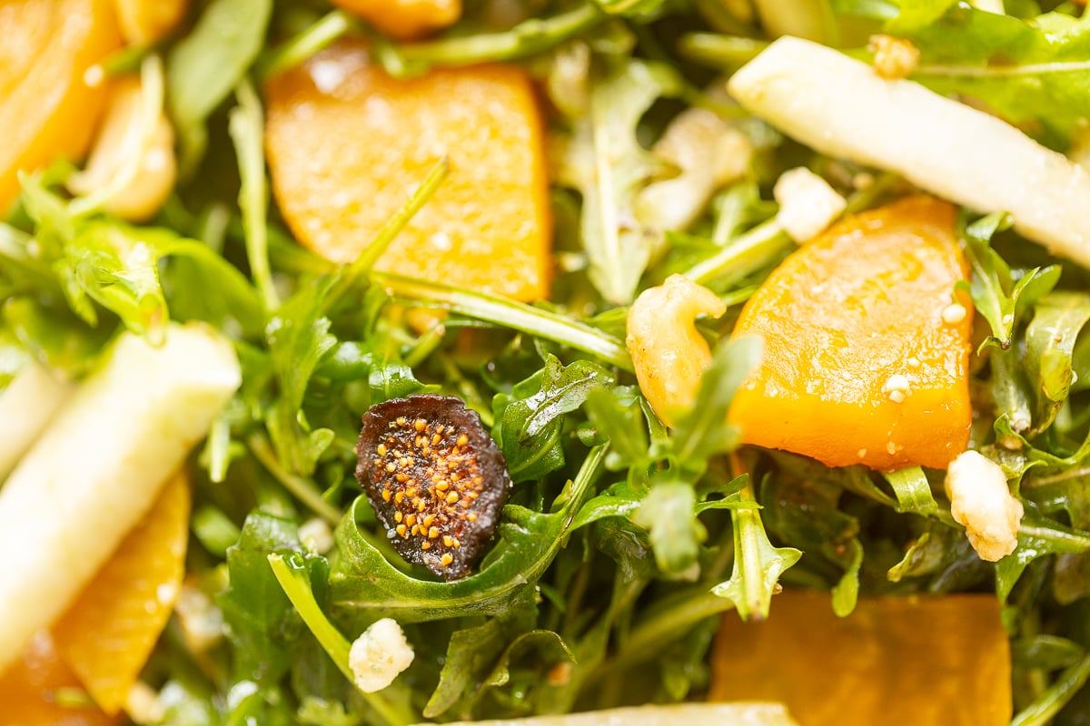 close up of a beet salad with arugula