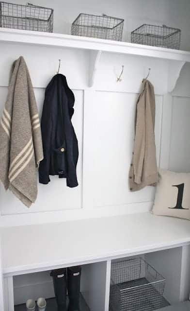 A white farmhouse inspired mudroom from a closet.