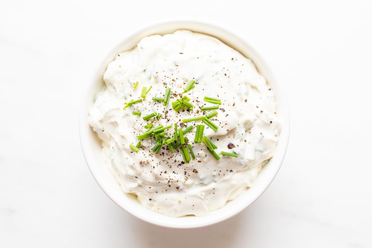 blue cheese dip in a white bowl.