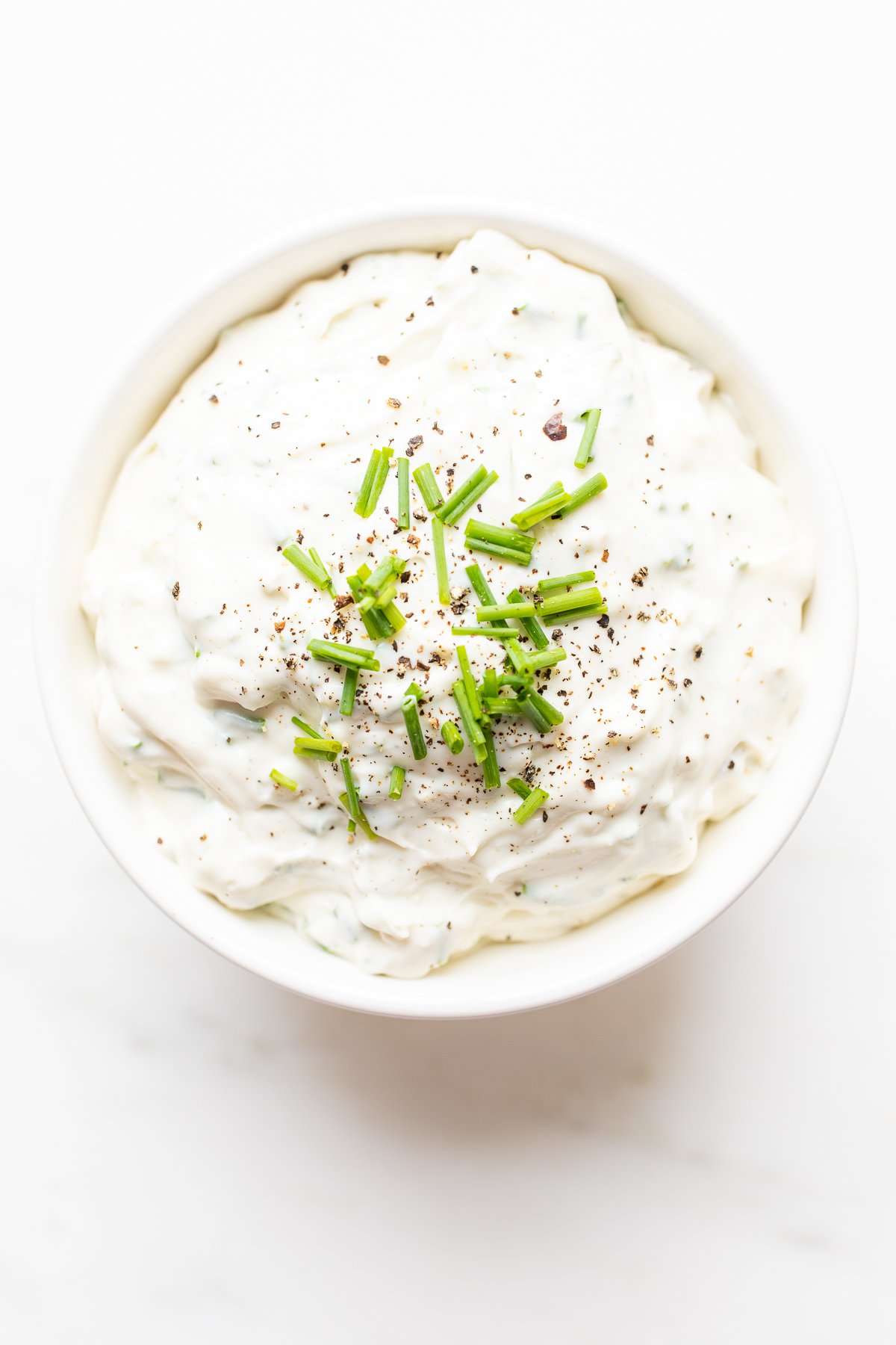 blue cheese dip in a white bowl.