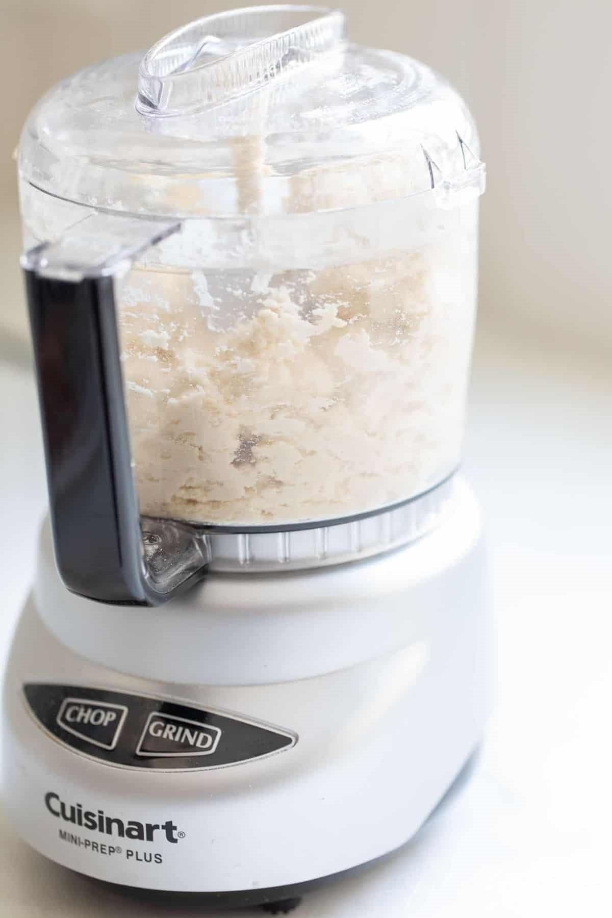 cream cheese pie crust inside a food processor