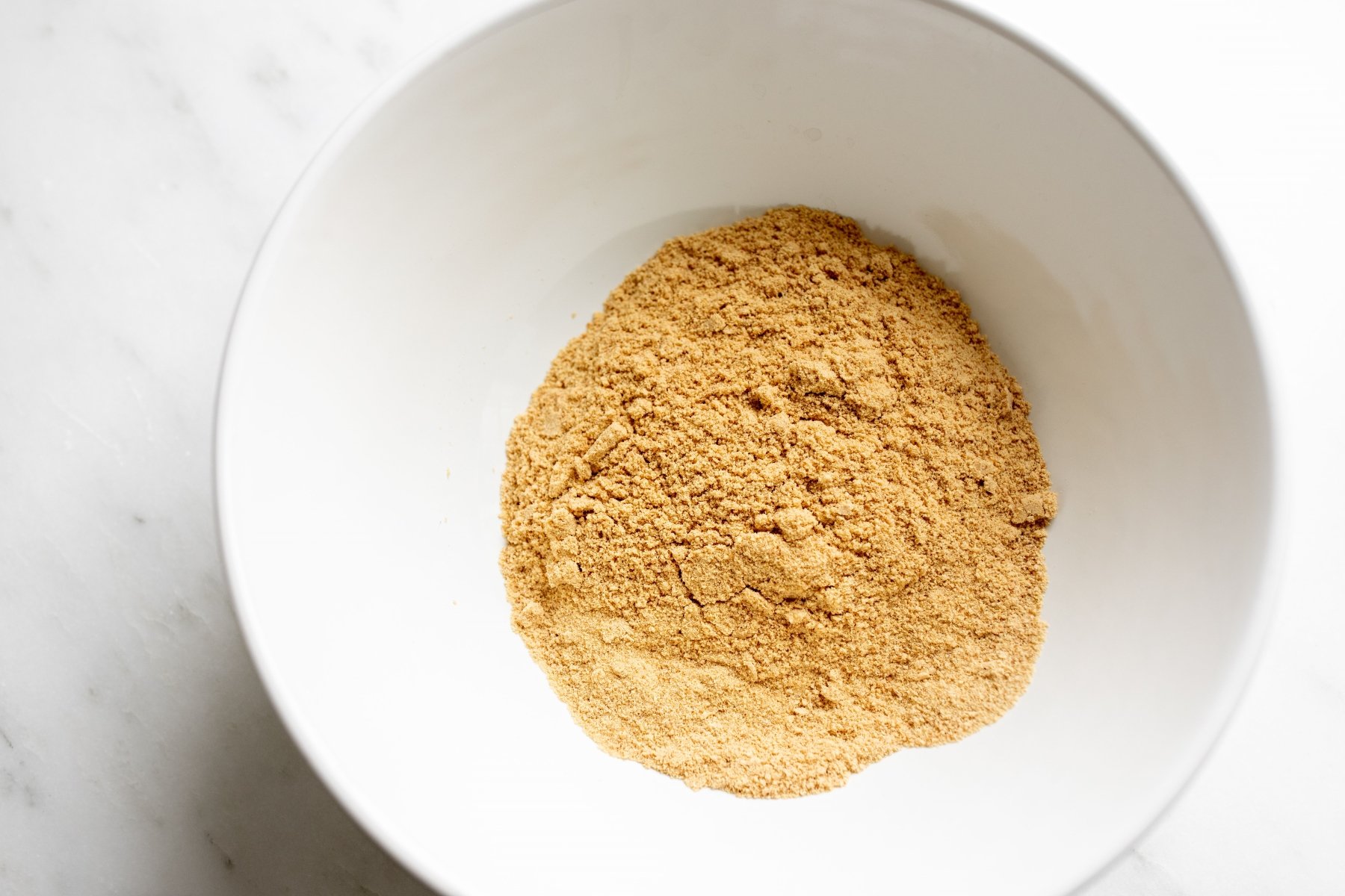 graham cracker crumbs in a white bowl