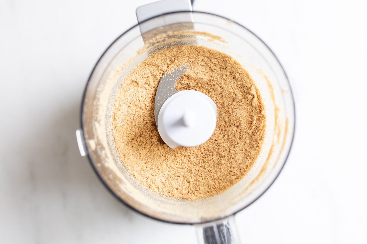 Graham cracker crumbs inside a food processor