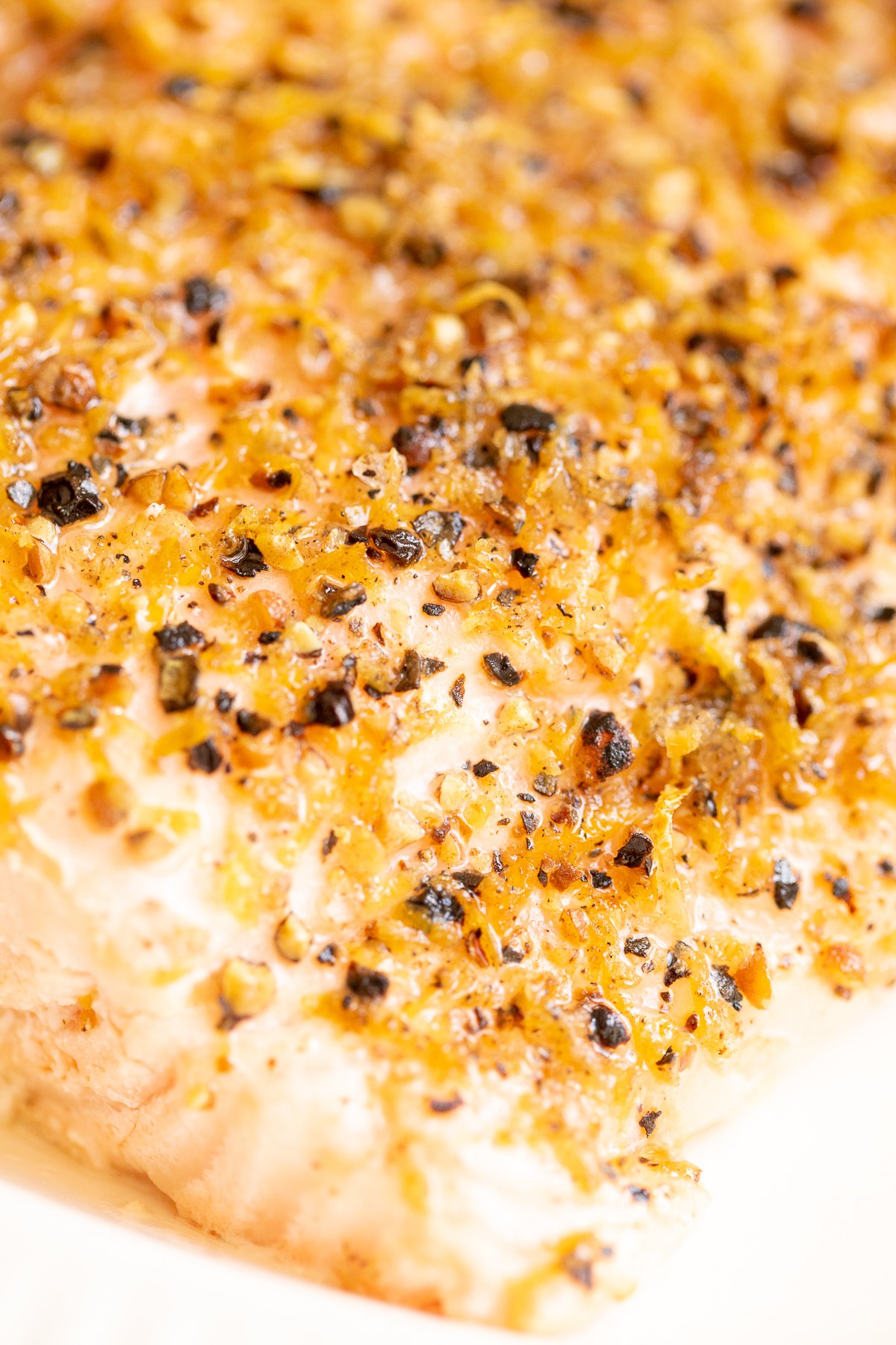 A close up of a lemon pepper salmon recipe