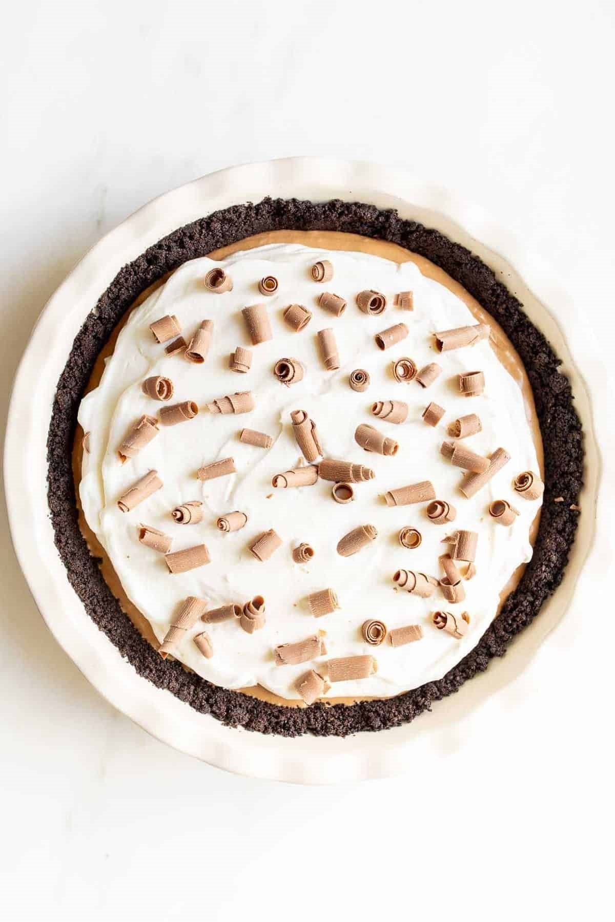 A French silk pie on a marble countertop.