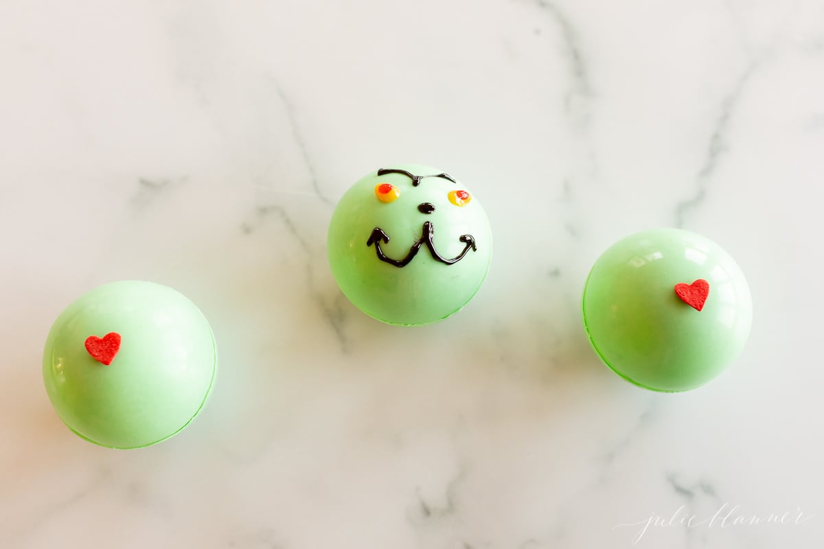 Three grinch hot chocolate bombs