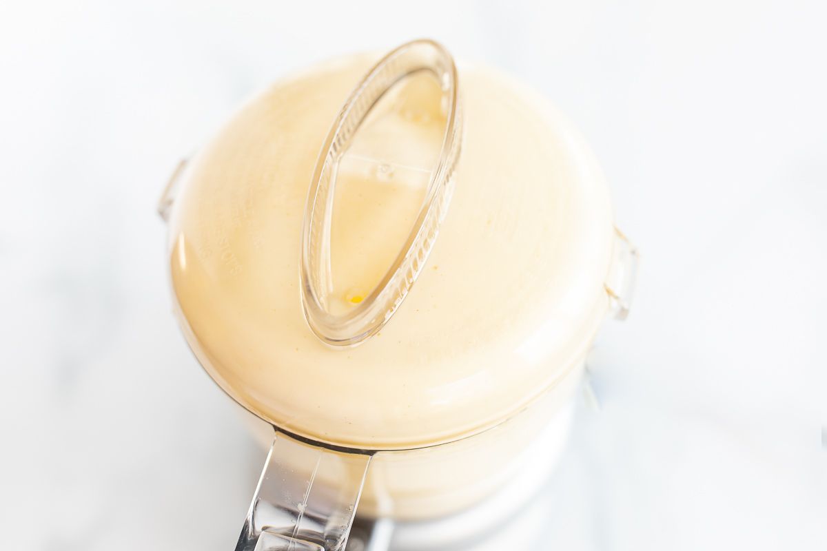 Homemade mayonnaise in a small food processor.