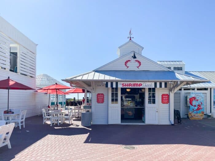 A charming white and red beach restaurant scene in Seaside Florida