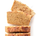 Banana bread with no baking soda or baking powder laid out on a white plate.