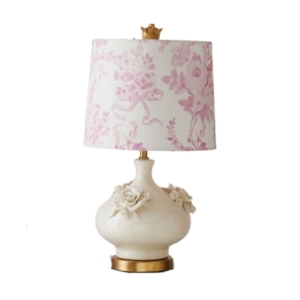 A table lamp with a pink floral pattern, perfect for a tween bedroom.