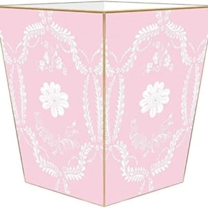 A pink and white trash can with a floral pattern, perfect for a tween girl bedroom.