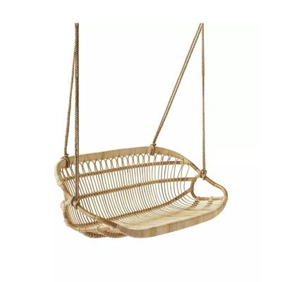 A rattan swing with a wooden seat for under deck relaxation.