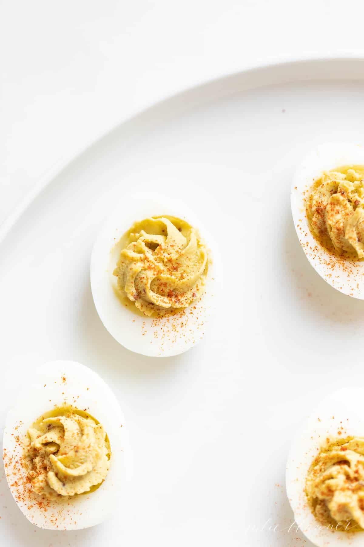 avocado deviled eggs on a platter