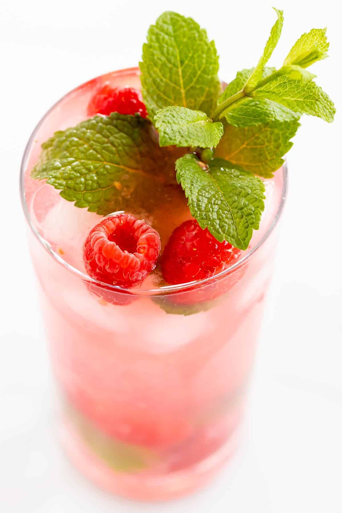 raspberry mojito garnished with mint spring