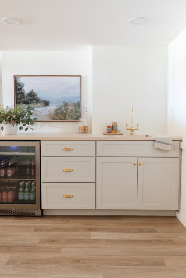 A kitchen with a Swiss coffee-colored refrigerator.