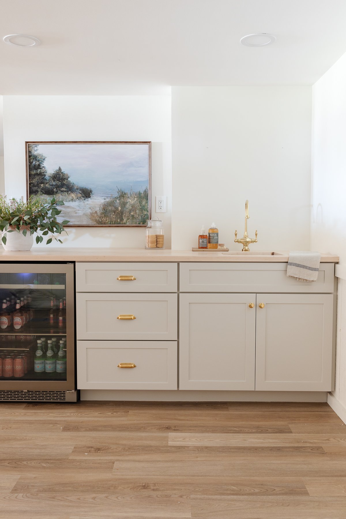 A kitchen with a Swiss coffee-colored refrigerator.