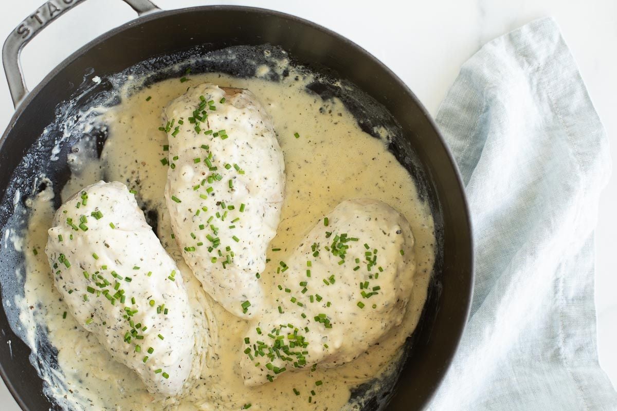 Boursin chicken in a cast iron skillet.