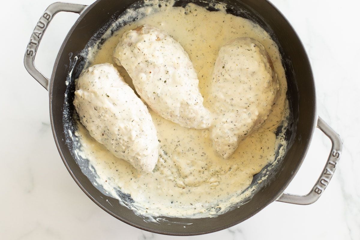 Boursin chicken in a cast iron skillet.