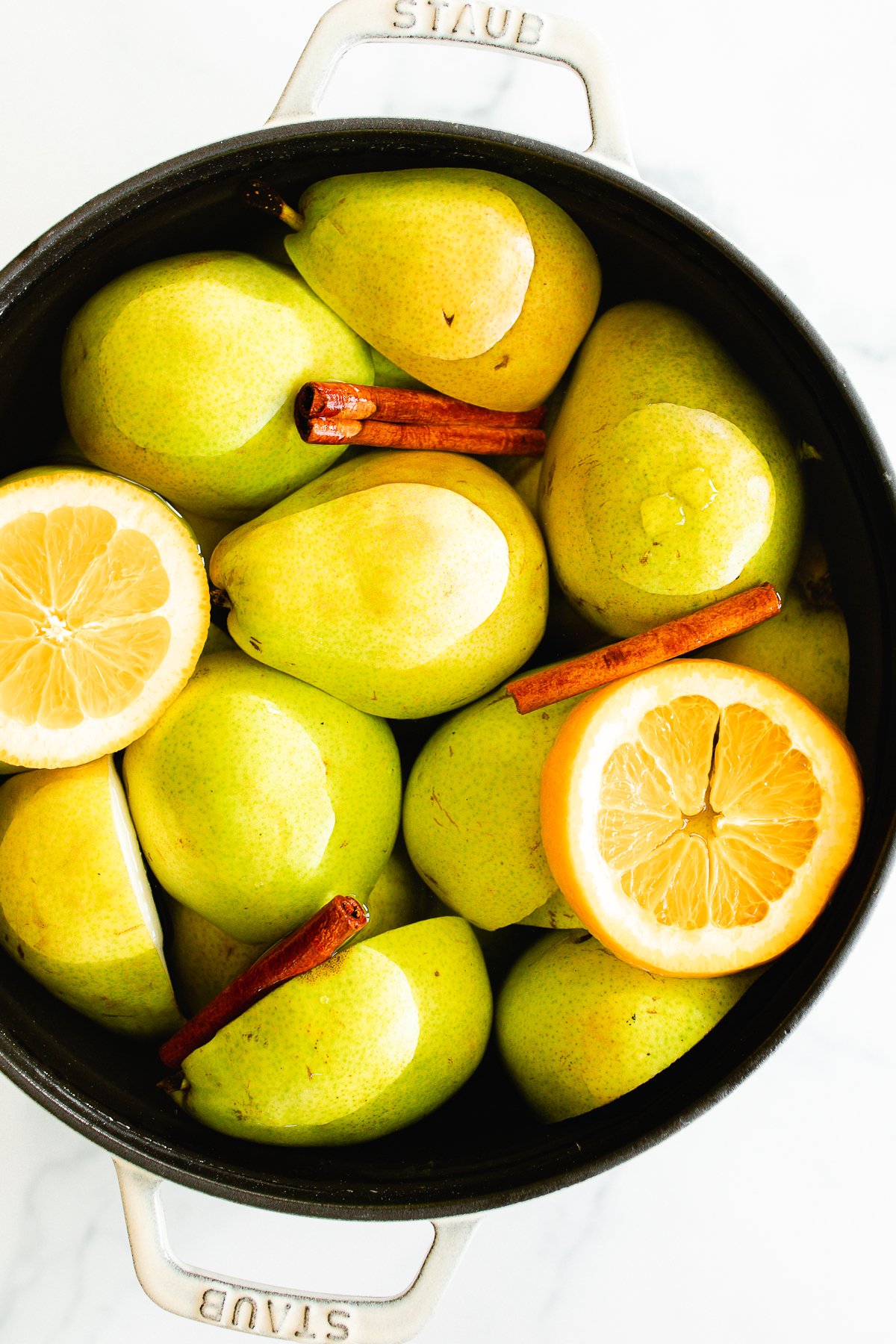 A pear cider recipe in a cast iron pot