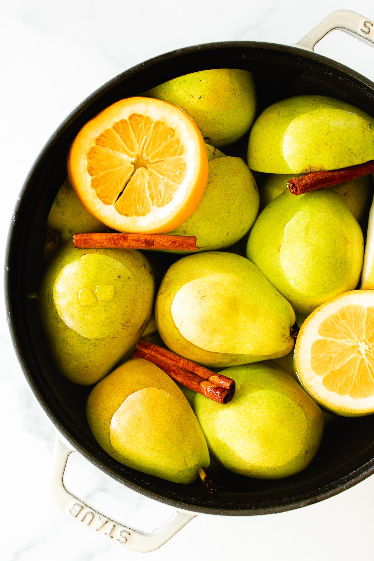 A pear cider recipe in a cast iron pot