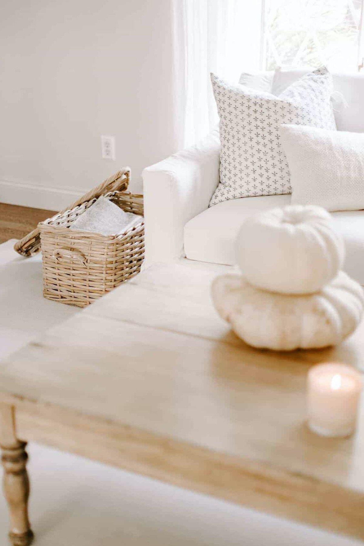 Fresh white pumpkins on a coffee table