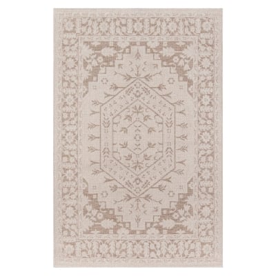 A neutral rug with an ornate design.