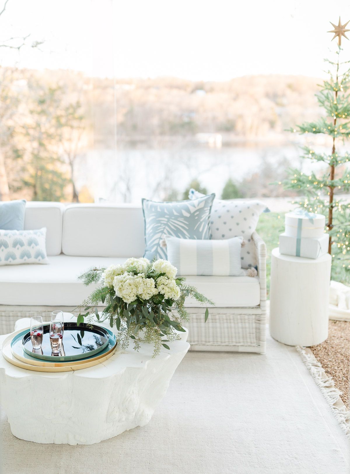 A patio with Serena and Lily outdoor furniture, dressed up for Christmas