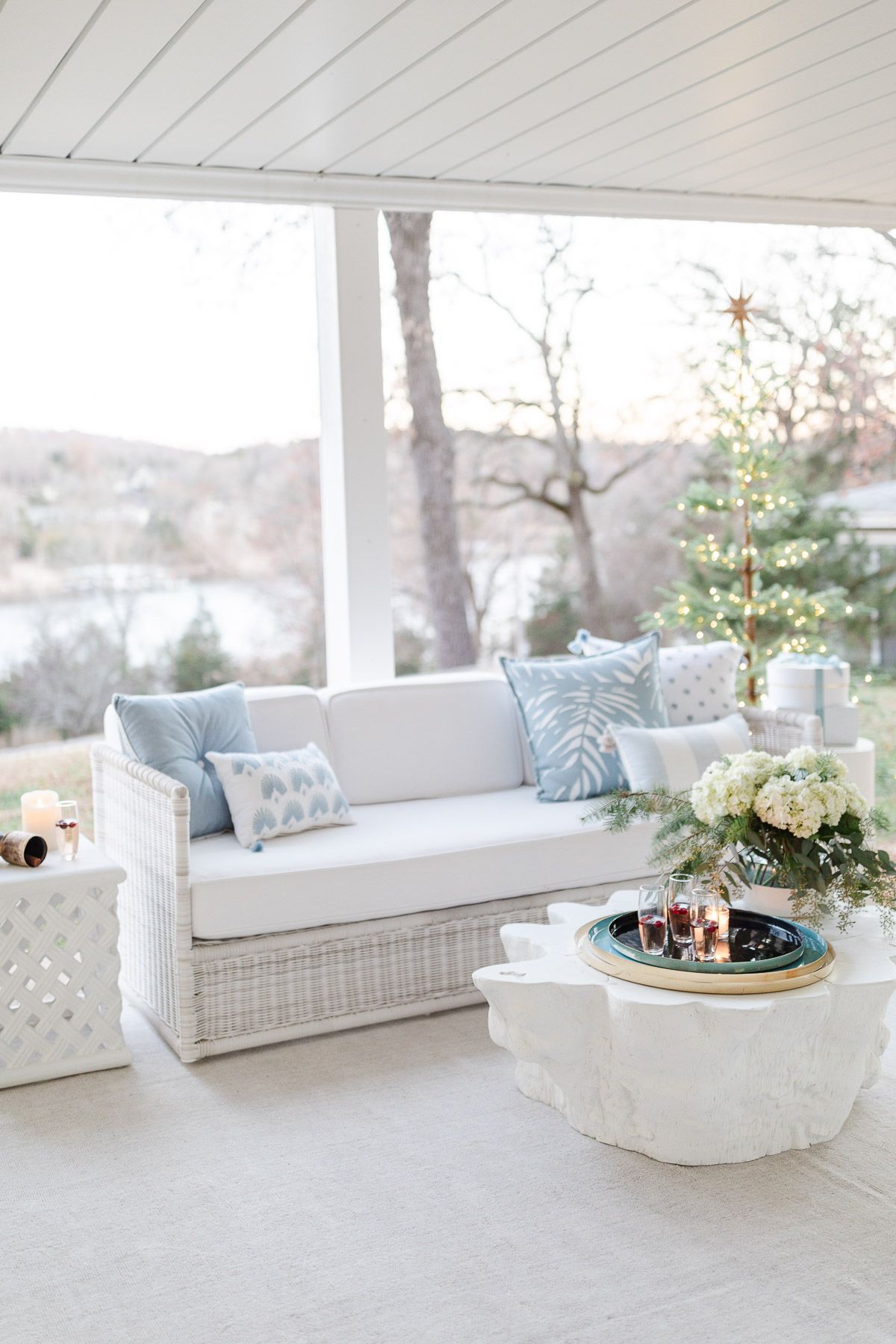 A patio with Serena and Lily outdoor furniture, dressed up for Christmas