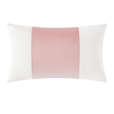 A pink and white pillow cover from Amazon home.