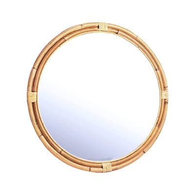 An Amazon home rattan mirror