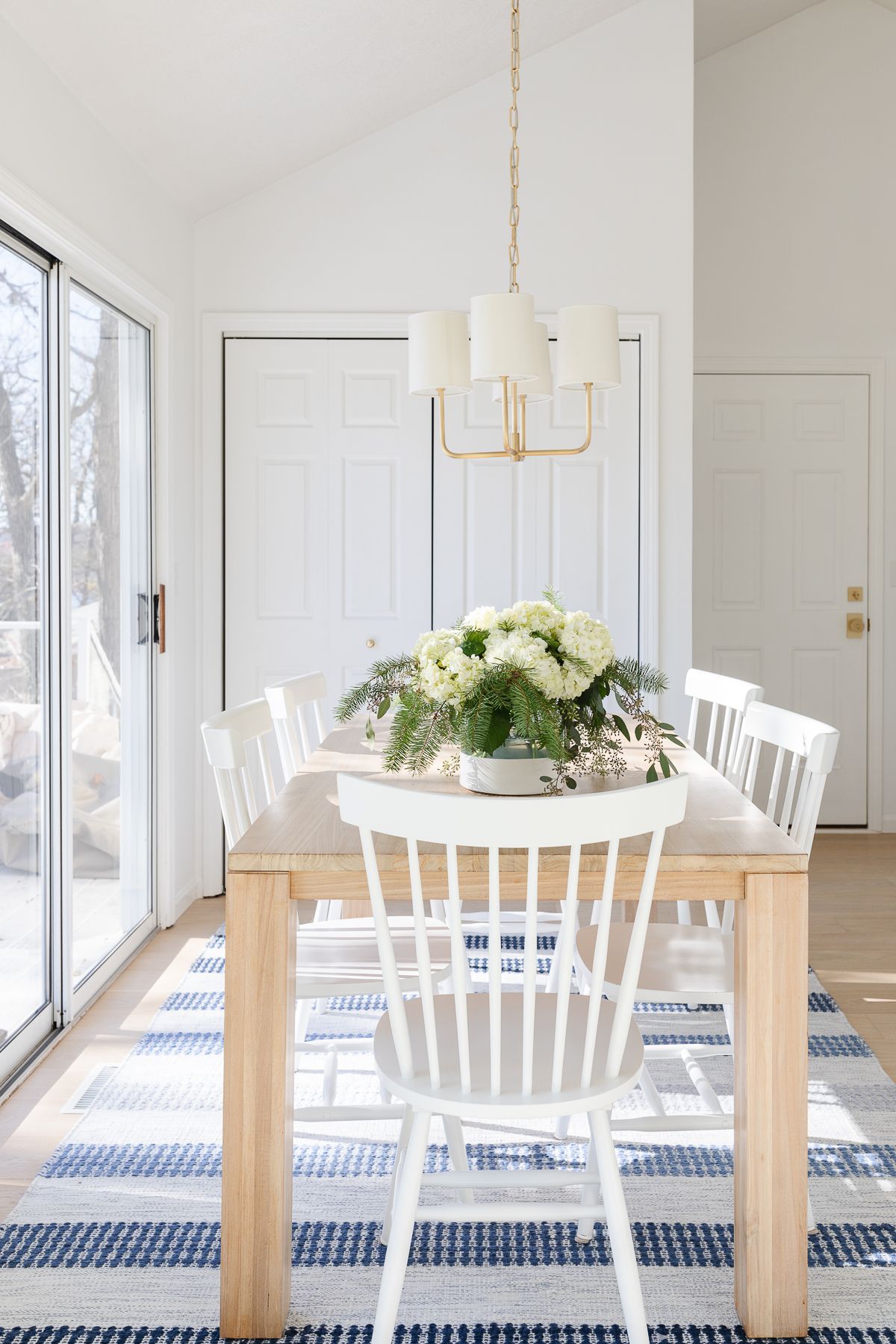 A dining room painted Benjamin Moore Chantilly Lace