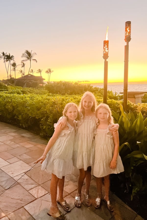 Three little girls with a Maui sunset in the background