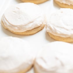 frosted cinnamon sugar cookies on a white platter