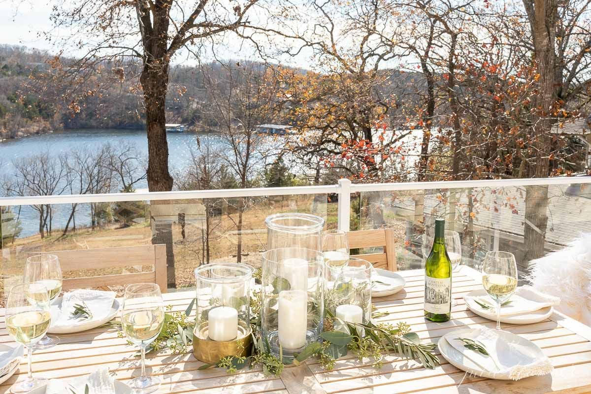 An outdoor table set for a Christmas dinner.