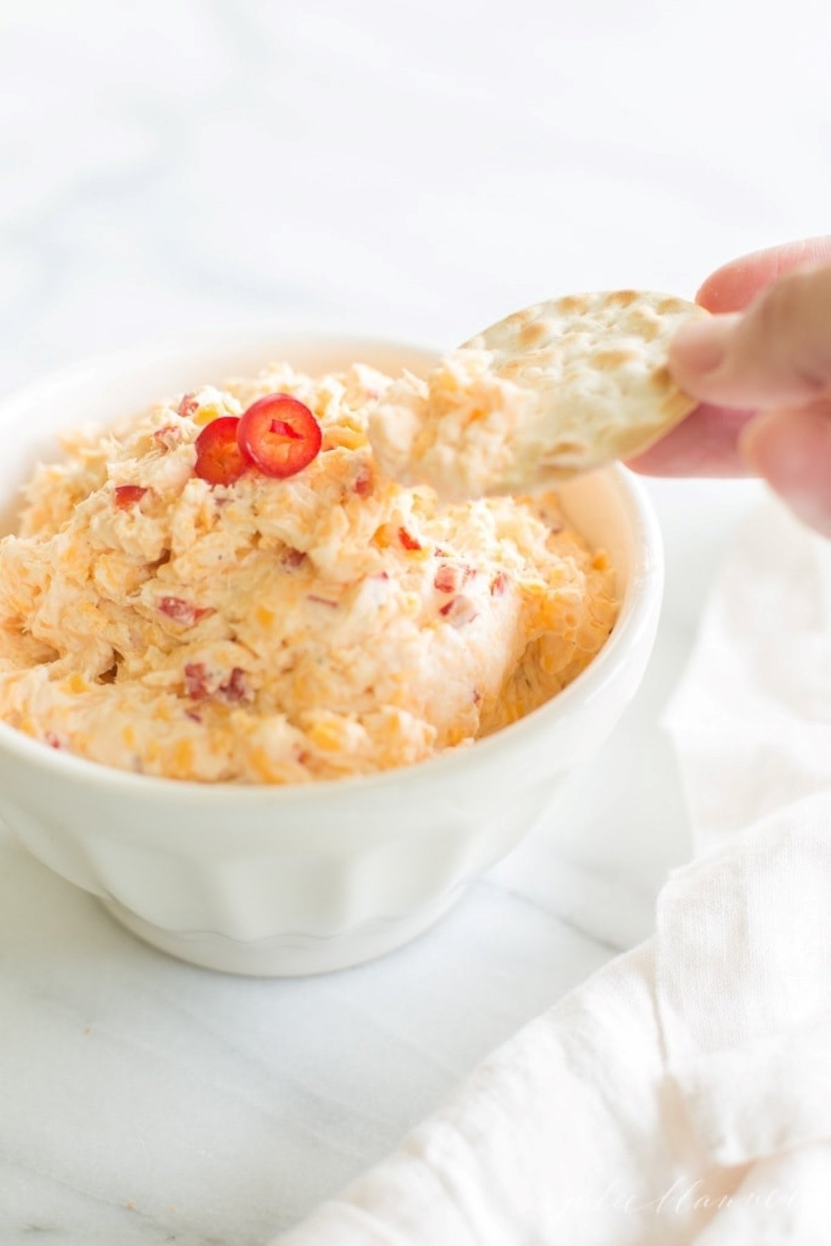 pimento cheese in a white bowl