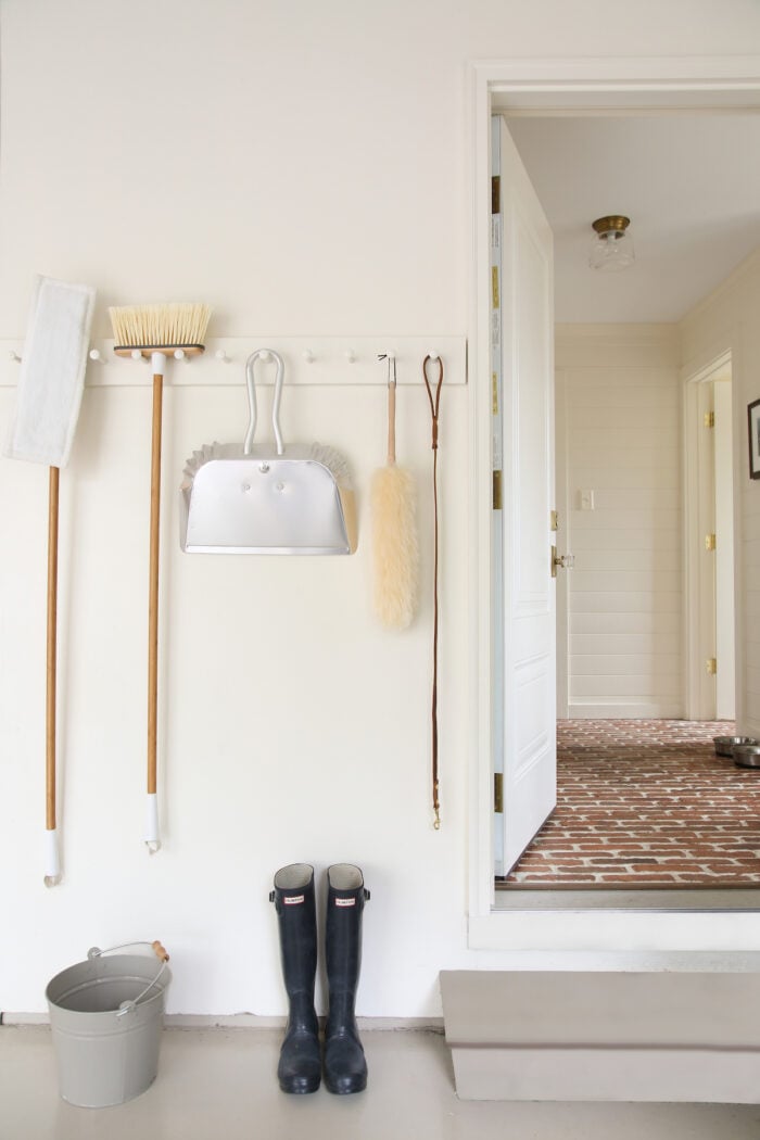 A garage with cleaning organization painted in a neutral paint color