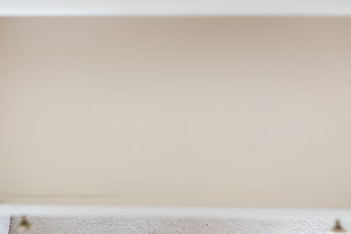 An empty nightstand drawer prior to nightstand organizer