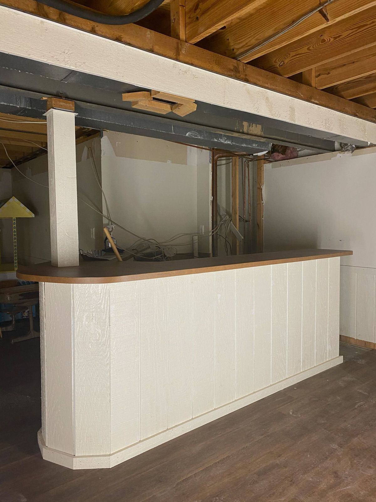 A basement bar in the process of remodeling