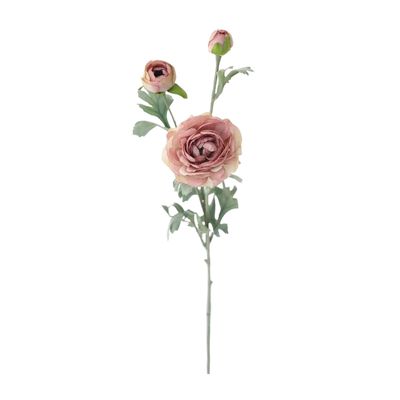 a pink faux flower against a white background.