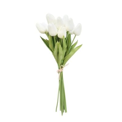 White faux tulips against a white background.