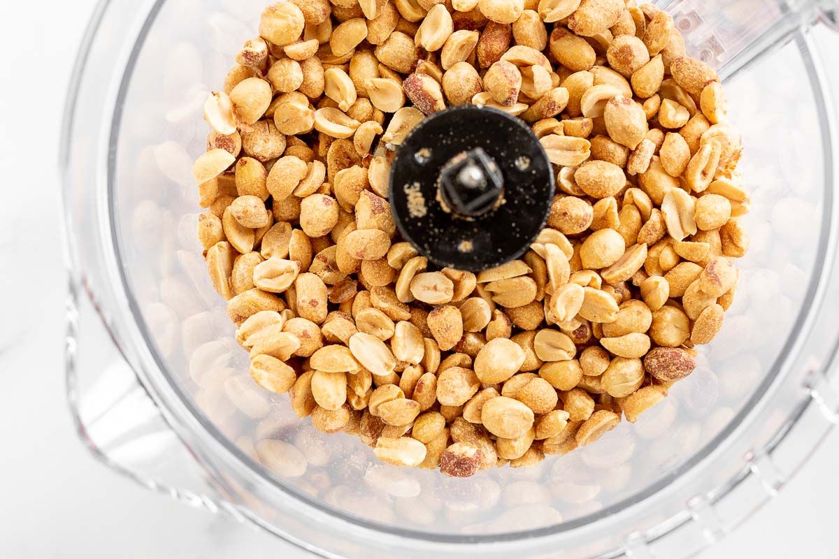 Peanuts inside a food processor.