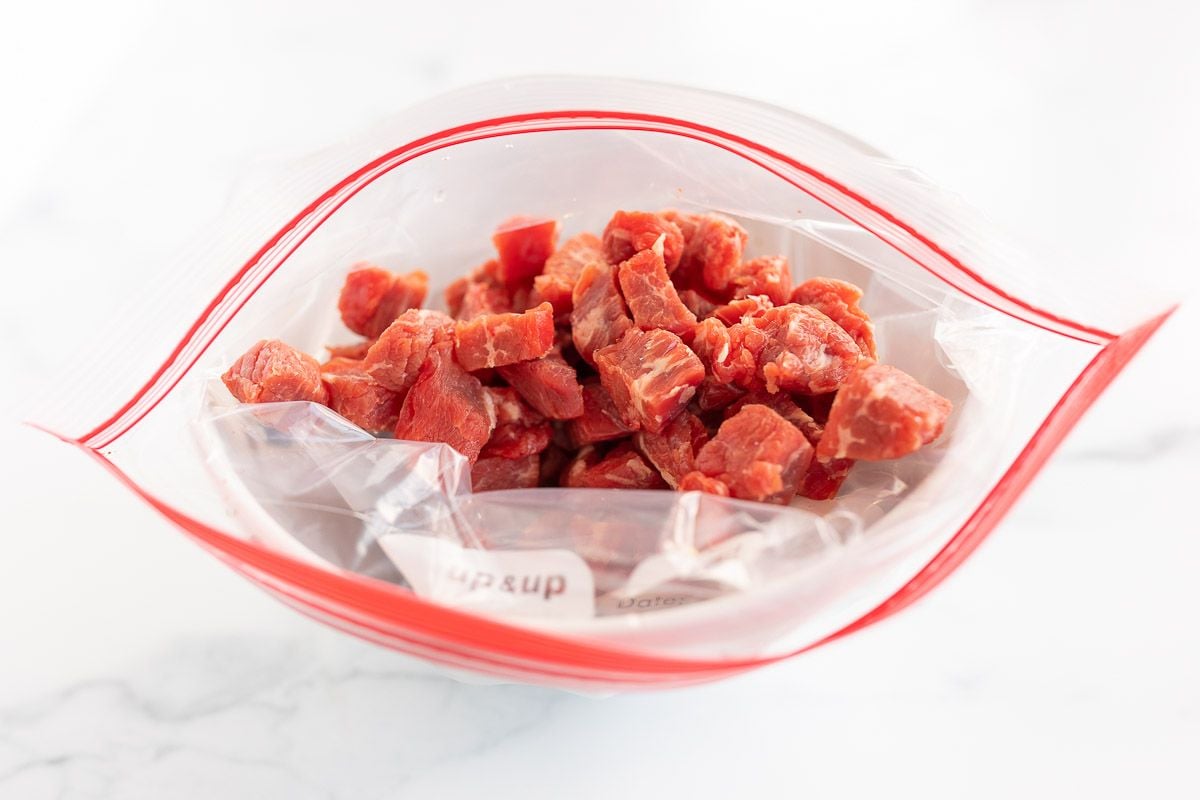 carne asada street taco meat marinating in a bag