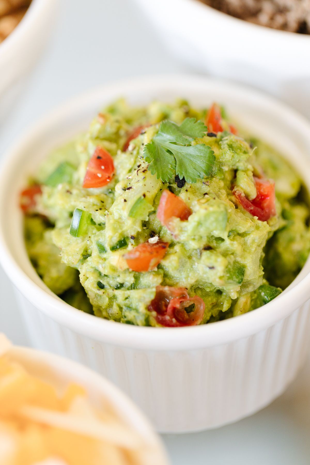 guacamole in a white bowl