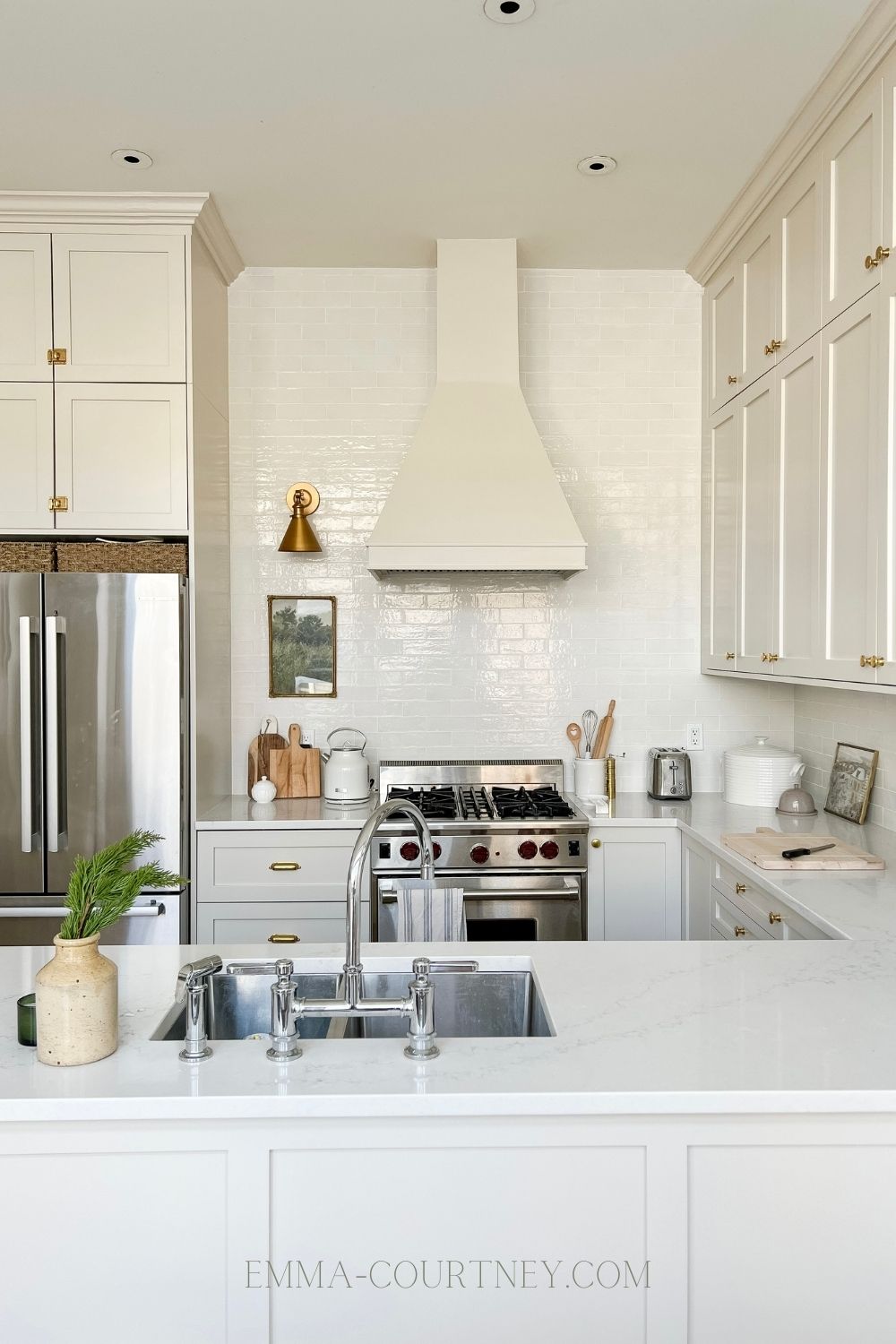 A kitchen with cabinets painted in Benjamin Moore Natural Cream